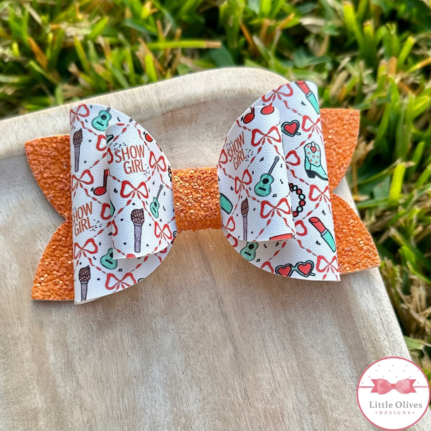 TS SHOWGIRL MUSIC BOW
