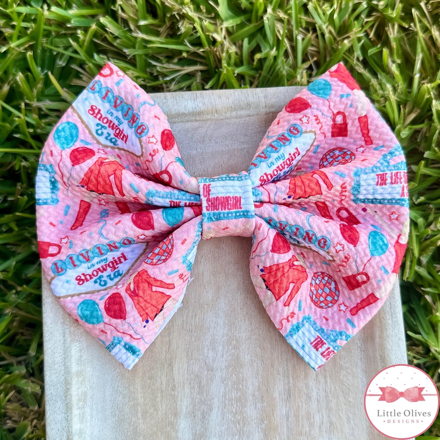 TS LIFE OF A SHOWGIRL BOW (peach)
