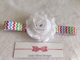 white flower with rainbow chevron headband