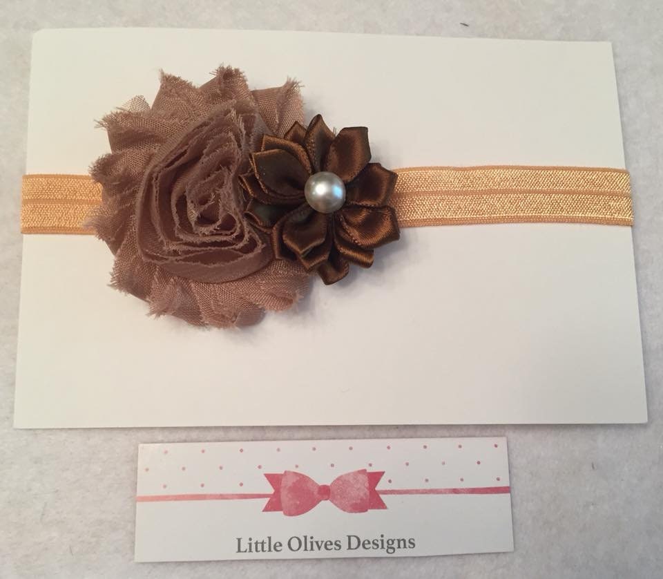 tan and brown flowers with gold headband