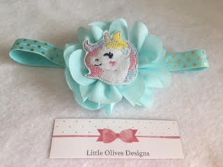 aqua flower with unicorn and aqua headband with gold dots