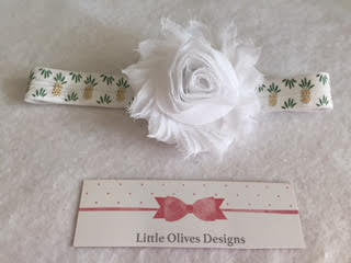 white flower with gold accent pineapple headband