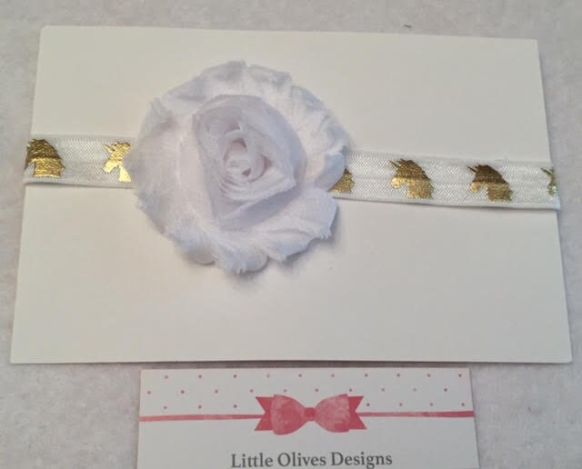 white flower with white and gold unicorn headband
