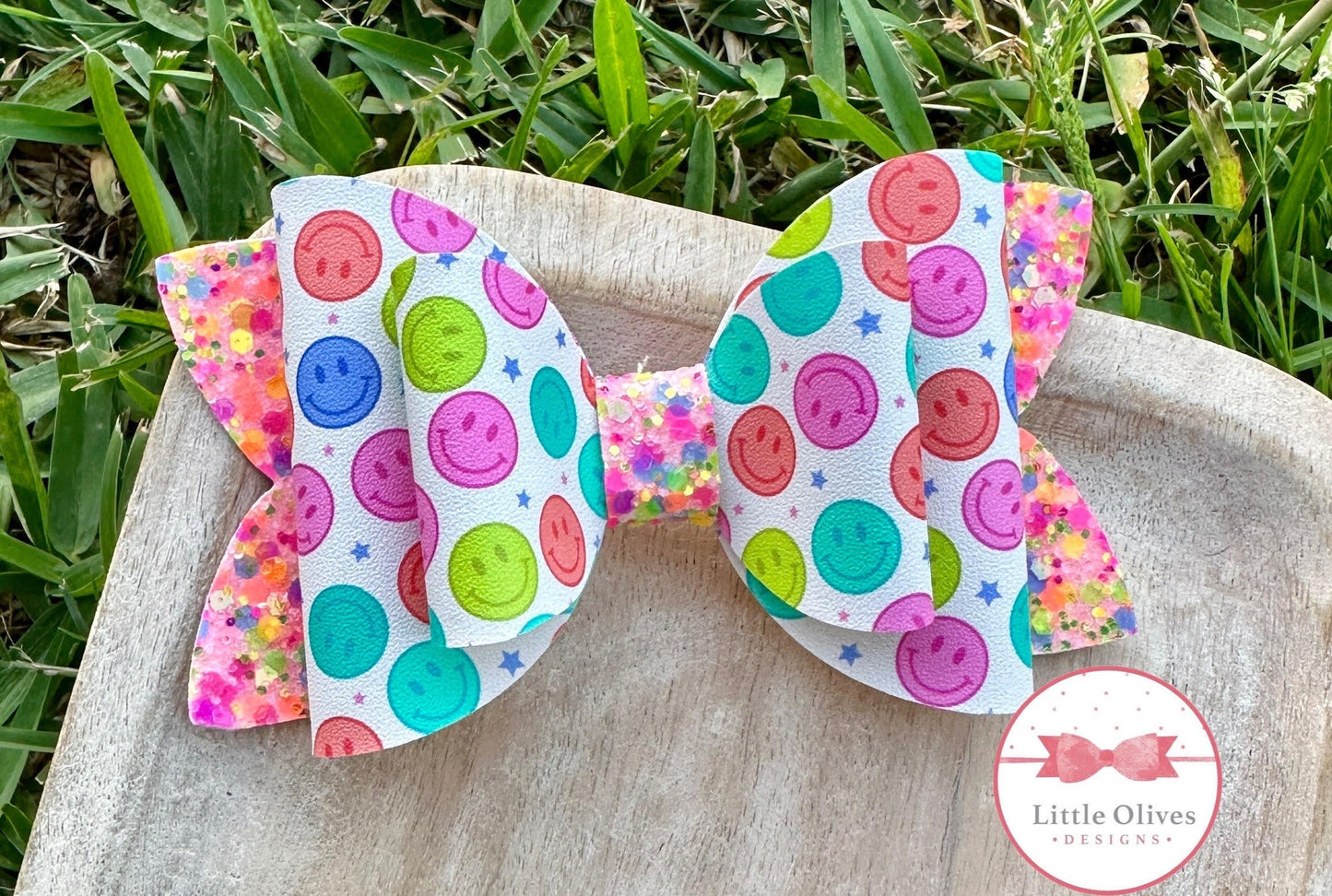 Bright smiley faces bow