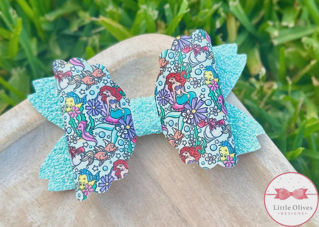 Red hair mermaid and friends bow