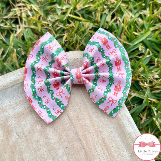 PINK CHRISTMAS NUTCRACKER PINCH BOW