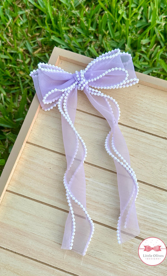 STACKED PURPLE PEARL TRIMMED ORGANZA BOW