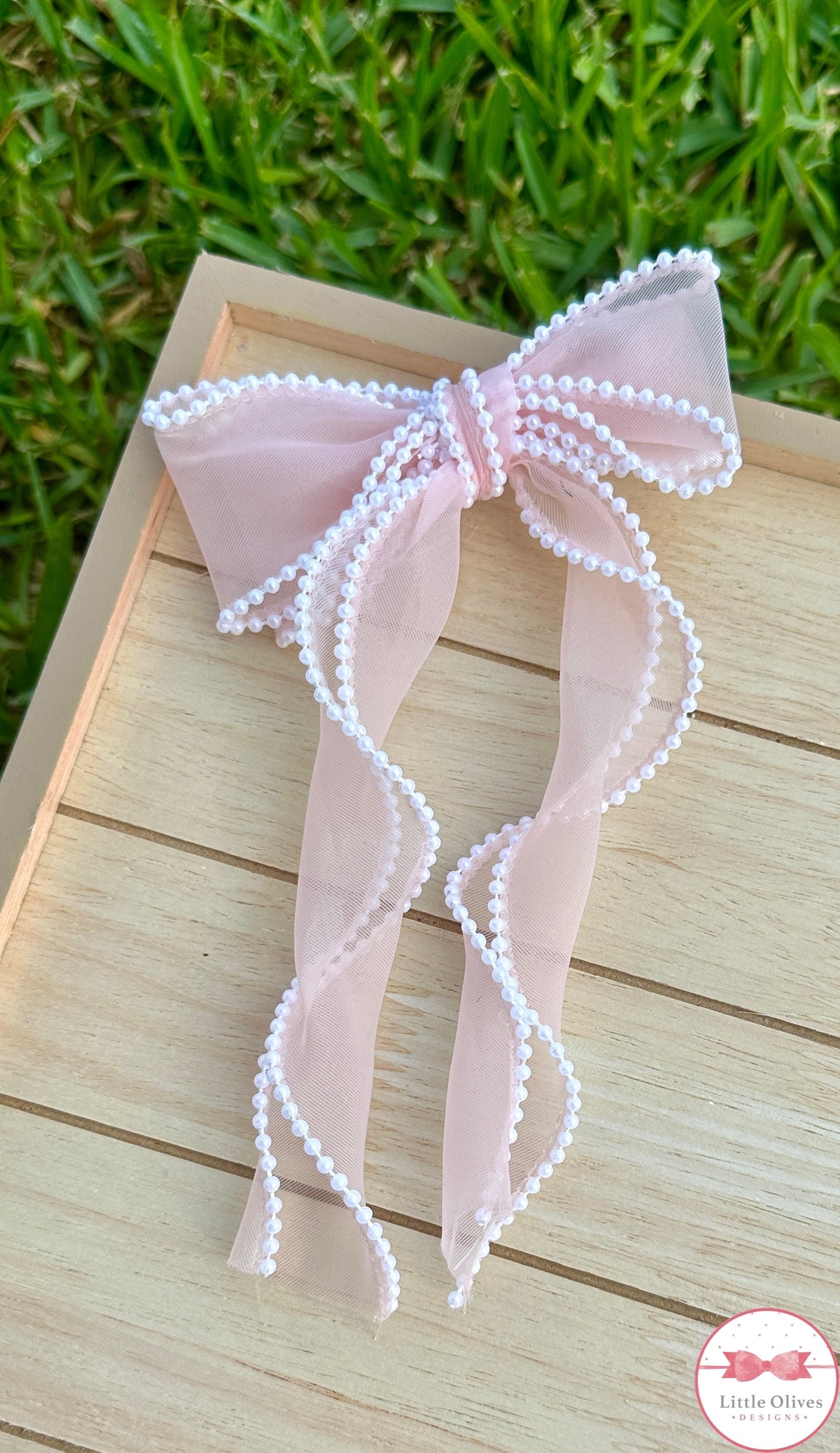 STACKED PEACH PEARL TRIMMED ORGANZA BOW