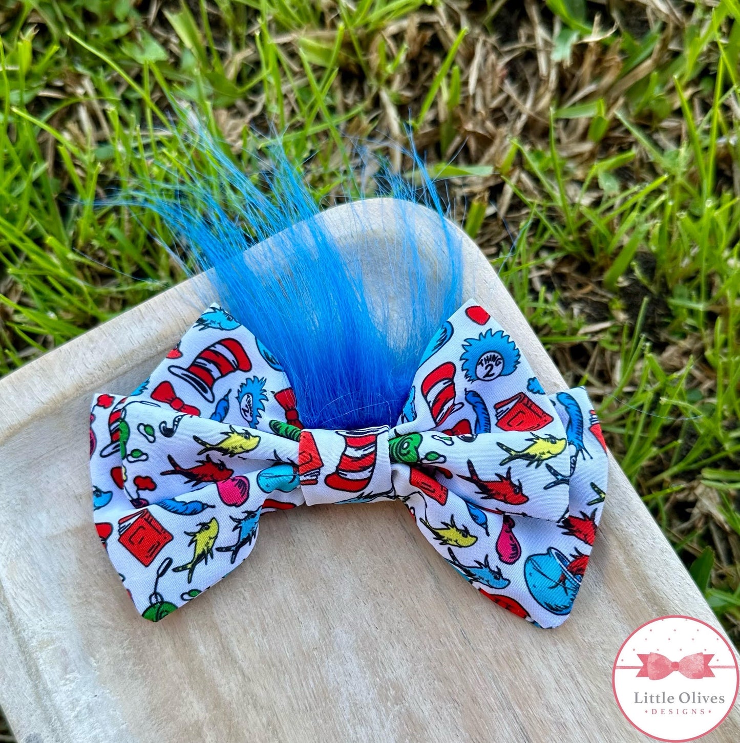 BLUE HAIRED TOSS BOW