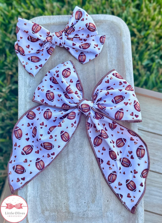 FOOTBALL HEARTS SOPHIE BOWS