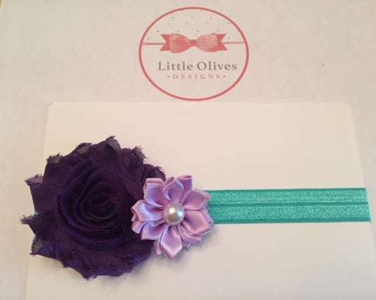 purple flower with lavender pearl petal flower and aqua band