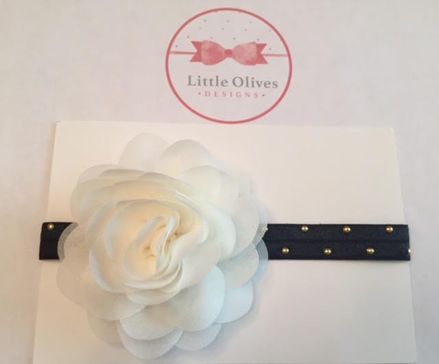 cream chiffon rose with black band with gold dots