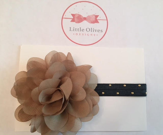 tan chiffon flower with black band and gold dots