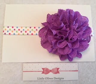 purple eyelet flower with rainbow dots headband