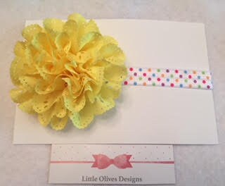 yellow eyelet flower with rainbow dots headband