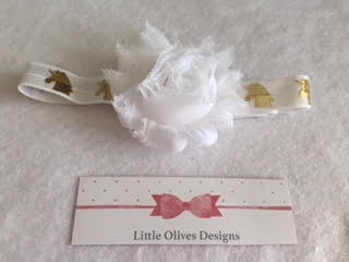white flower with gold accent white headband
