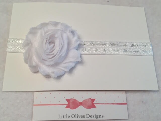 white flower with white and silver arrow headband