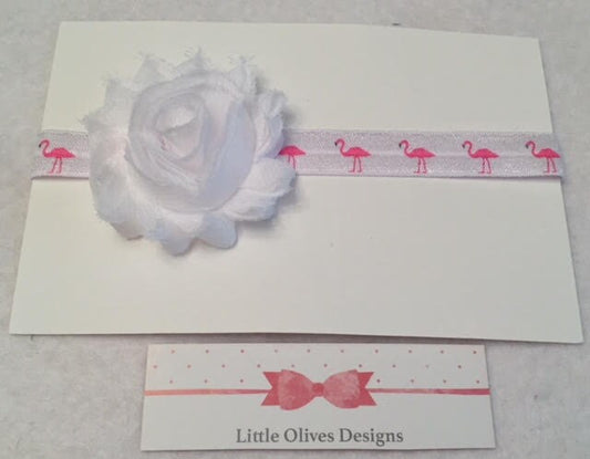 white flower with pink and white flamingo headband