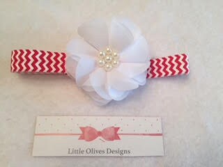 white flower with red and white chevron headband