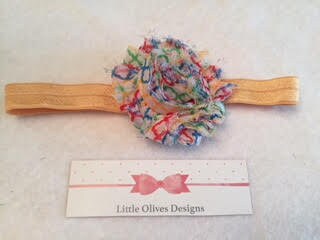 rainbow quatrefoil flower with gold tone headband