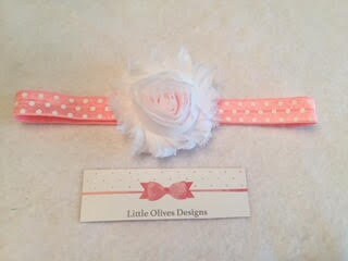 white flower with pink and white polka dots headband