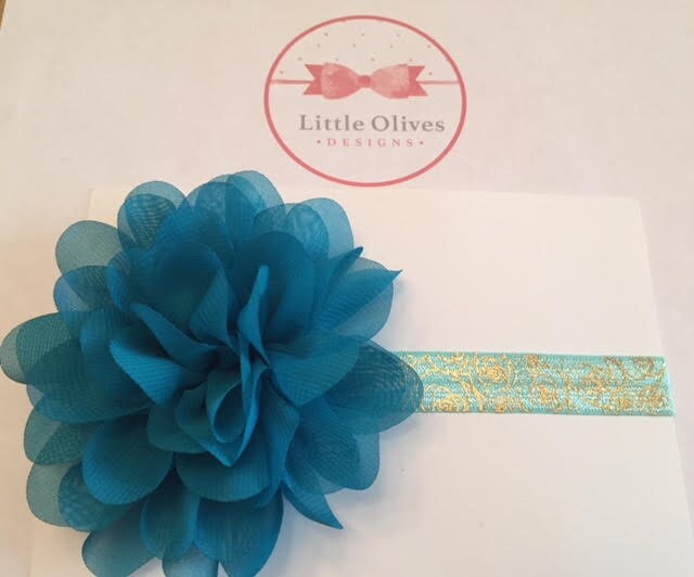 aqua with gold rose band and large teal chiffon flower