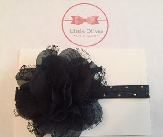 large chiffon/lace flower with black band with gold dots