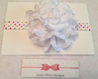 white eyelet flower with rainbow dots headband