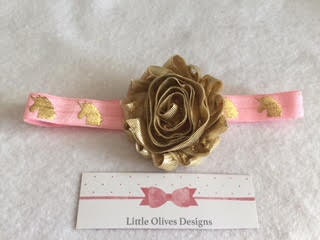 gold flower with pink headband with gold unicorn accent
