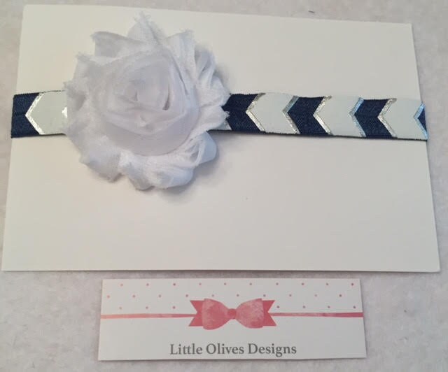 white flower with blue and white chevron headband