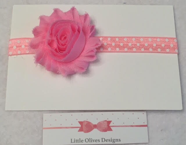 light pink flower with pink and white dots headband
