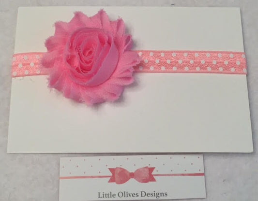 light pink flower with pink and white dots headband