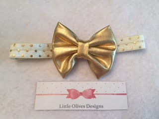 gold faux leather bow with ivory and gold dots headband