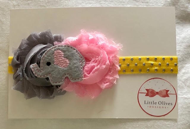 gray elephant with pink and gray flowers and yellow gold dot headband