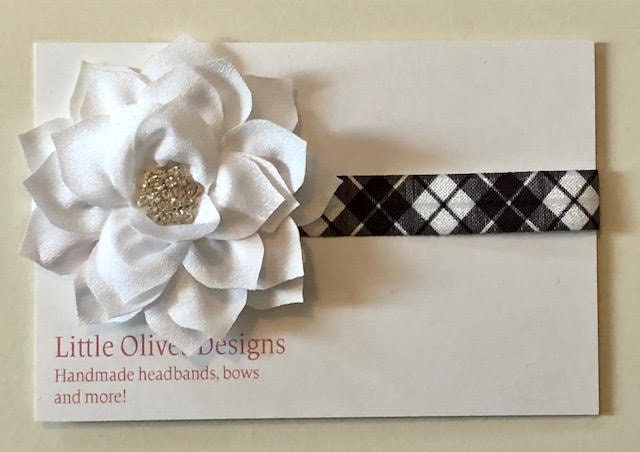White poinsettia with white and black plaid headband