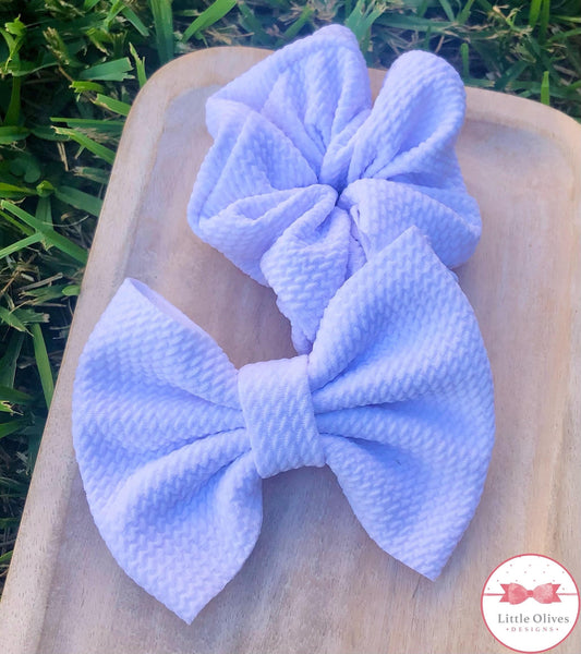 white scrunchie or bow
