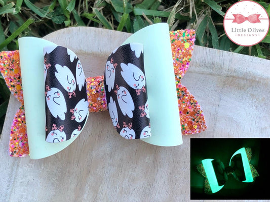 Glow in the dark orange ghosts bow