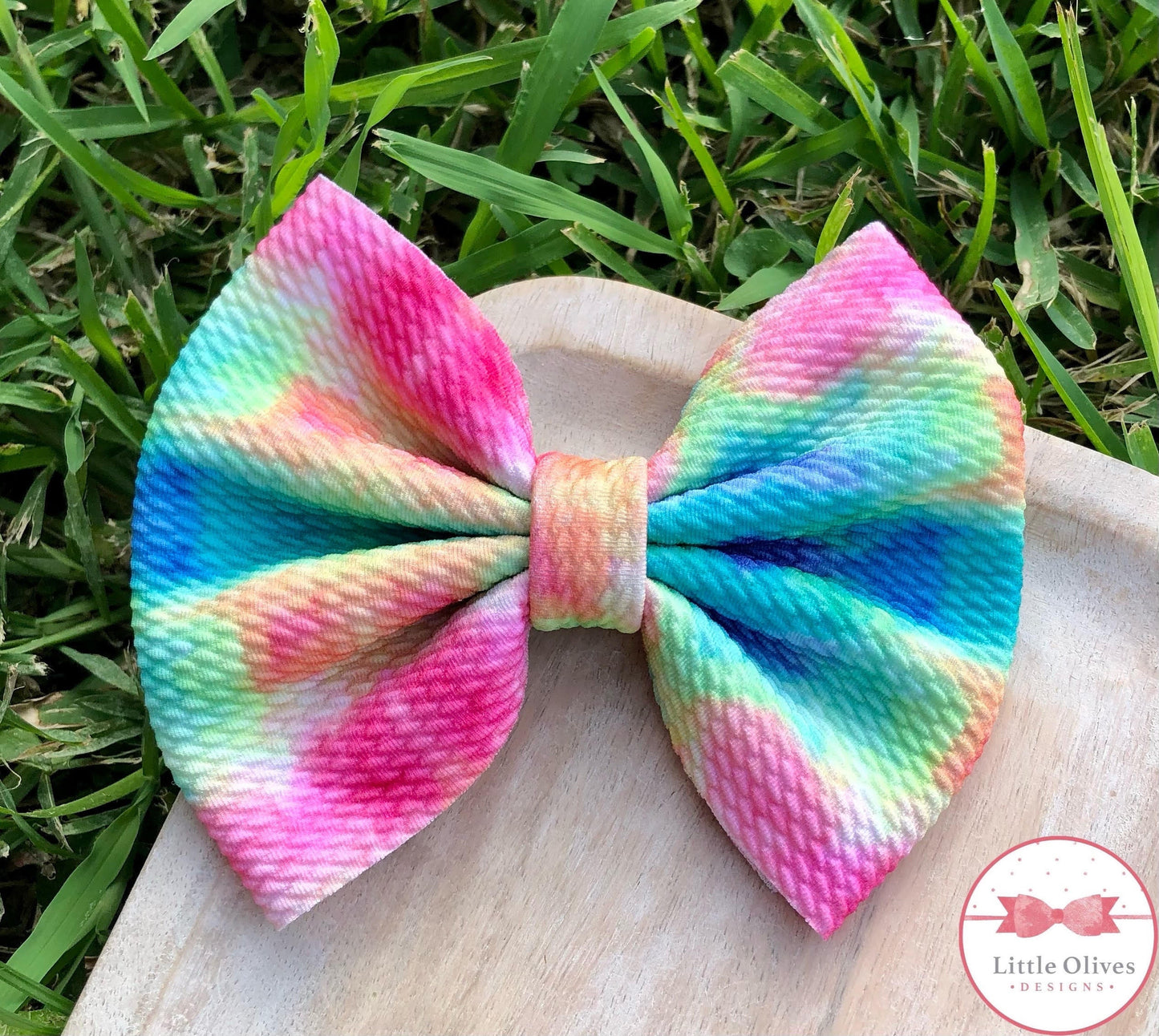Melted rainbow fabric bow