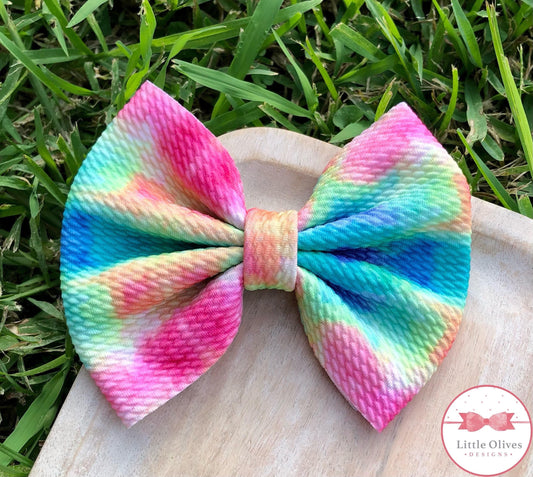 Melted rainbow fabric bow
