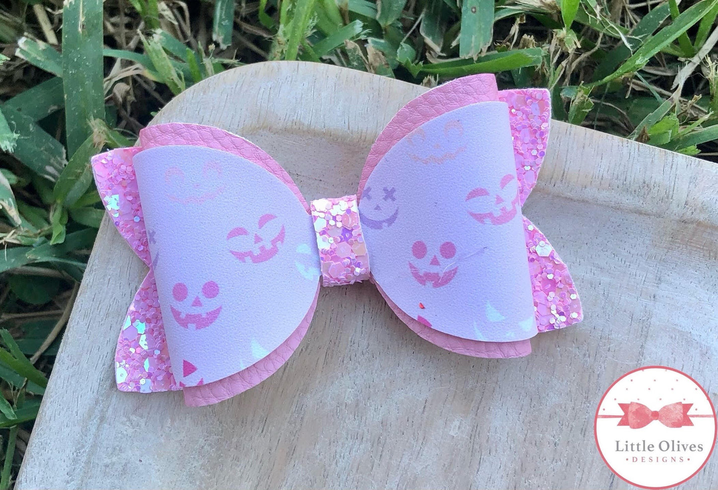 Pink jack o lantern Halloween bow