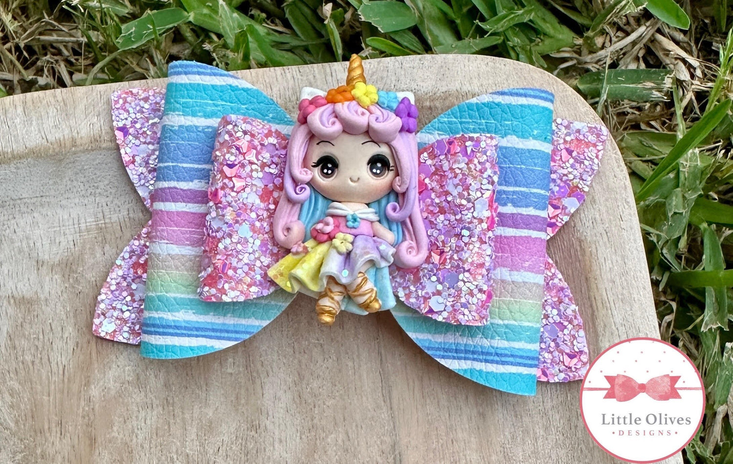 Rainbow unicorn girl clay bow