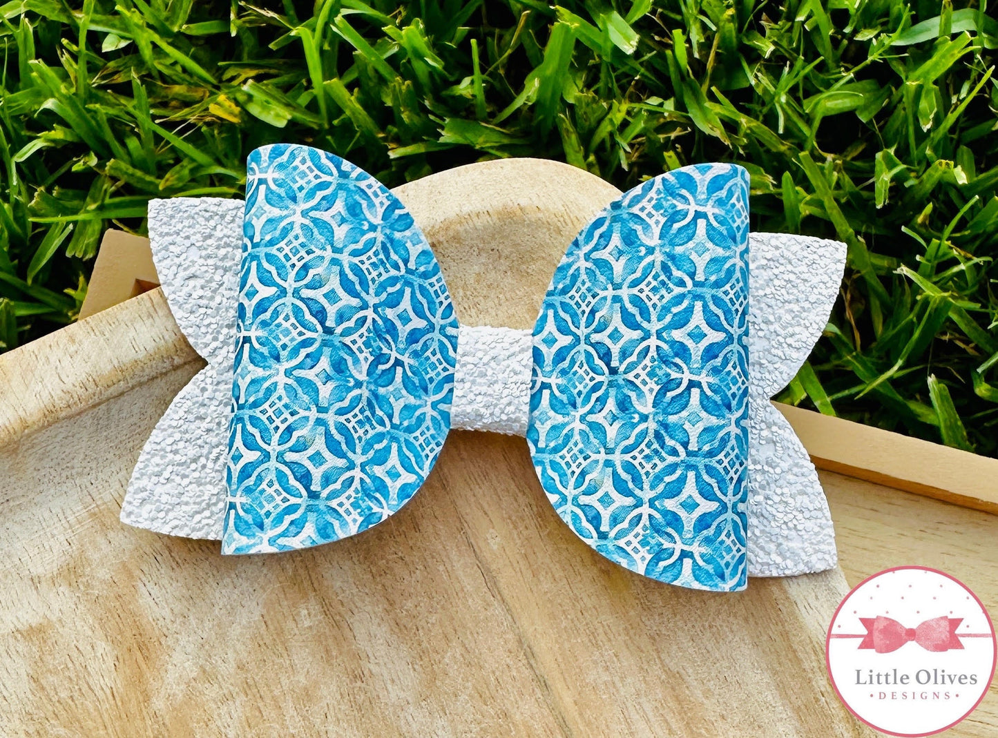 Light blue tile bow