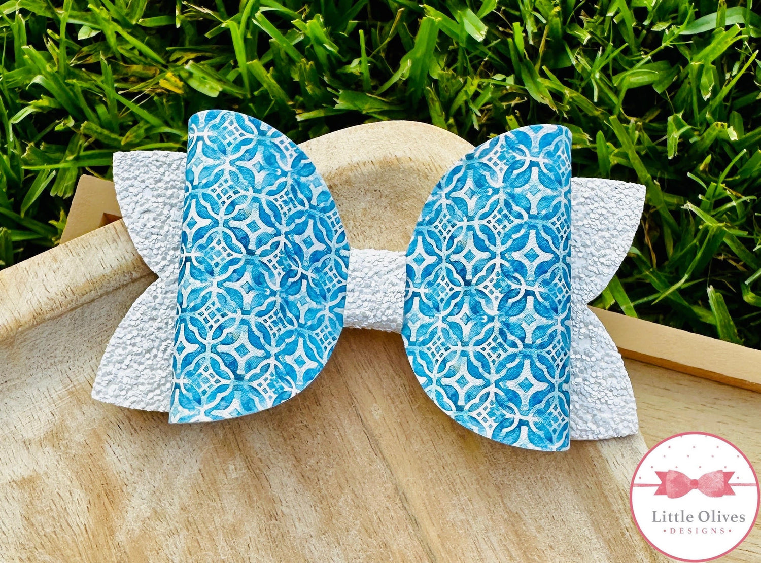 Light blue tile bow