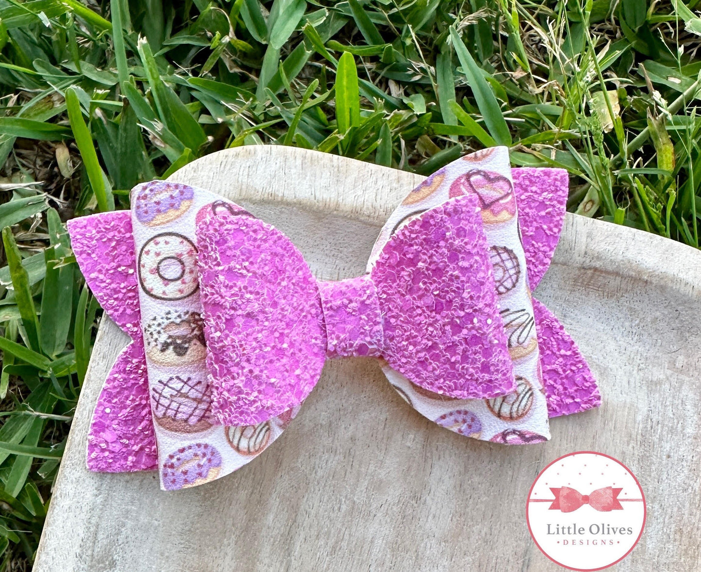 Purplish donuts bow