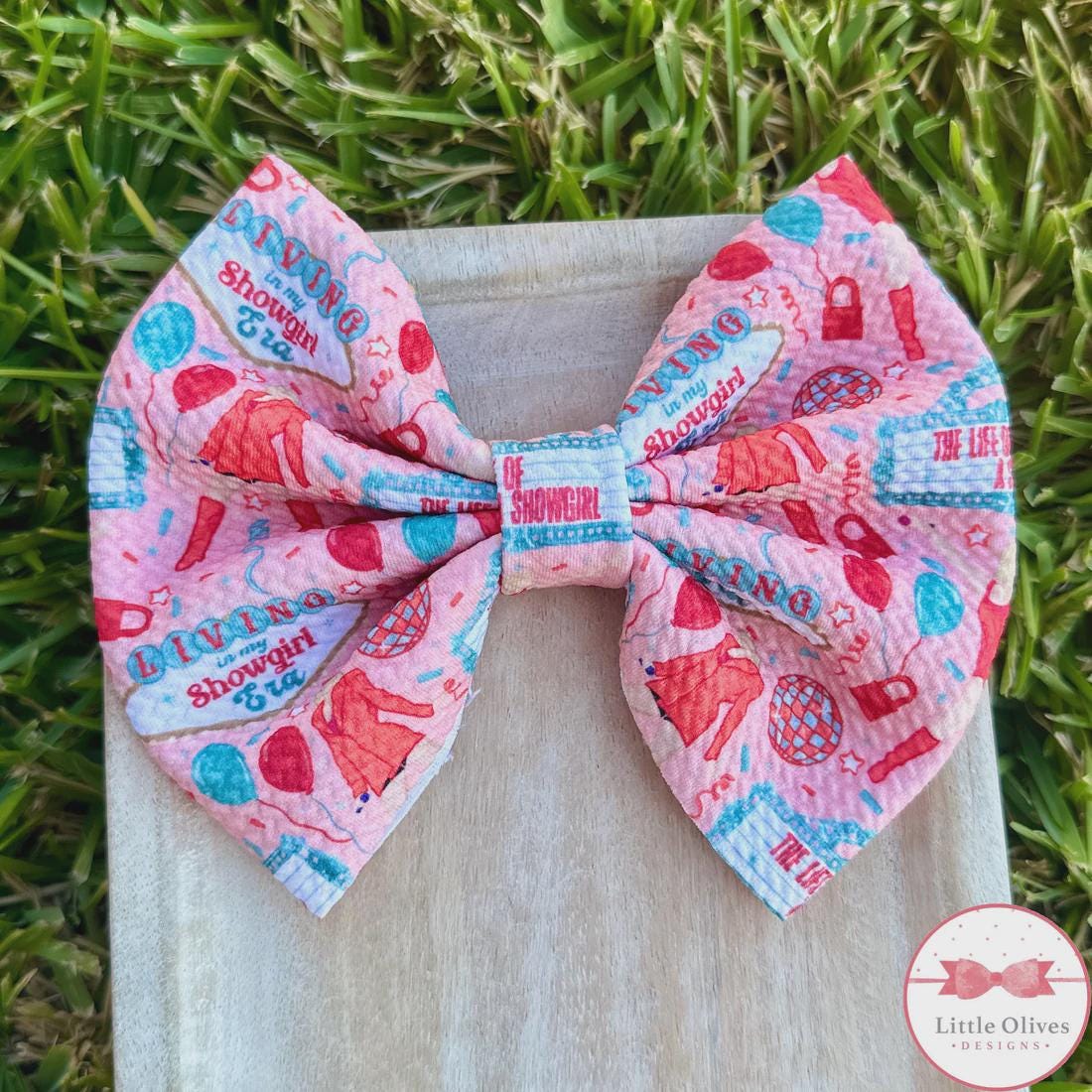 Showgirl orange bow