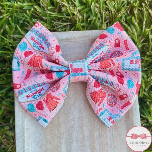 Showgirl orange bow