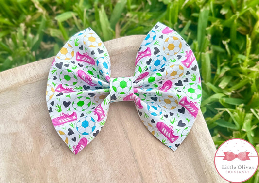 PINK SOCCER CLEATS PINCH BOW