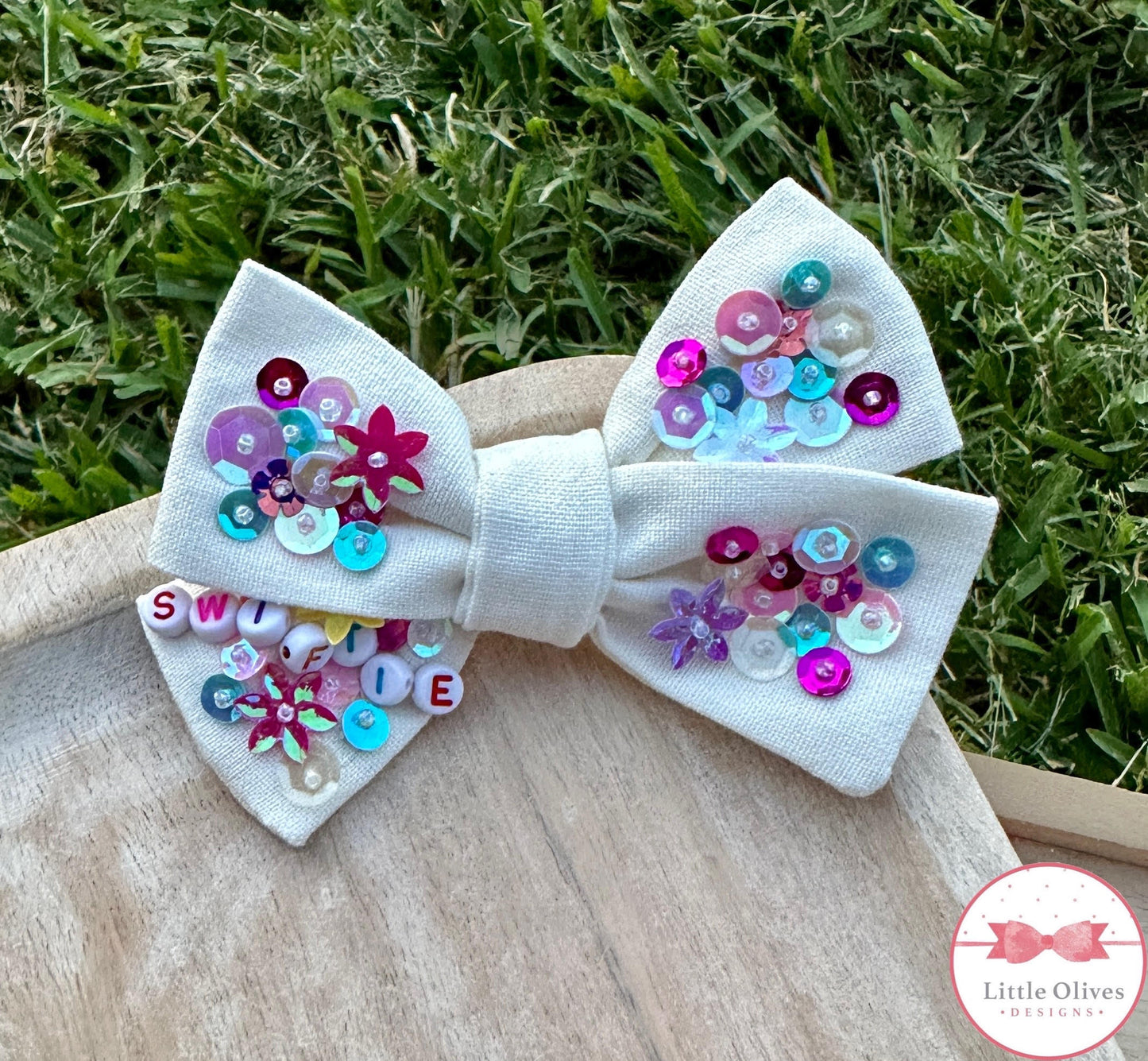 SWIFTIE SEQUIN LINEN BOW