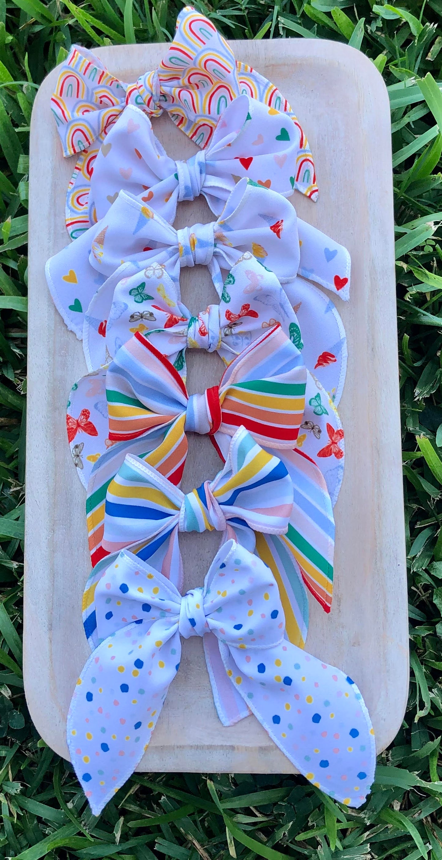 BRIGHT HAND TIED BOWS