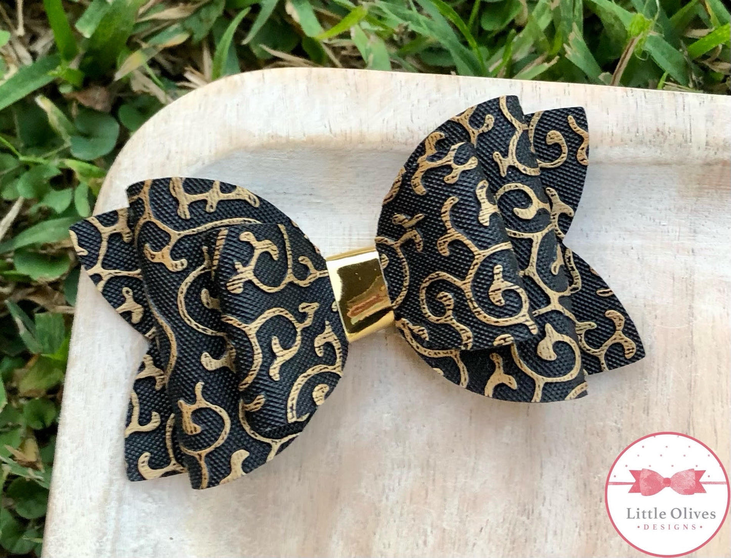 GOLD AND BLACK EMBOSSED BOW